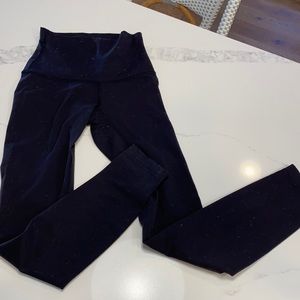Lululemon Black High Rise Tight size 0